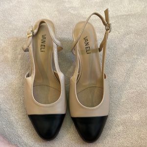 Van Eli Tan and black heels